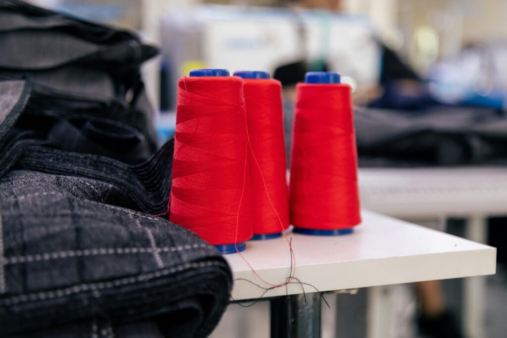 Spools of thread used for clothing manufacture